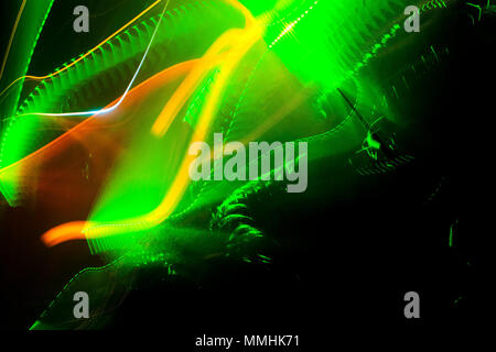 Lasershow in a club, disco with music, quite abstract, green laser Stock Photo