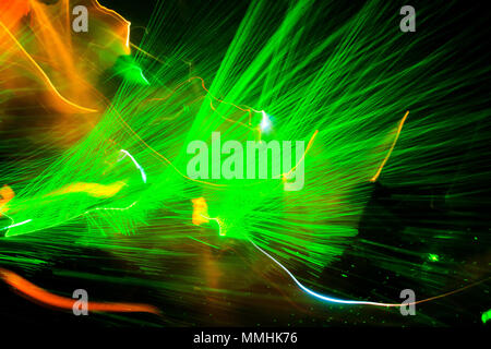 Lasershow in a club, disco with music, quite abstract, green laser Stock Photo