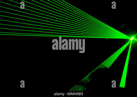 Lasershow in a club, disco with music, quite abstract, green laser Stock Photo