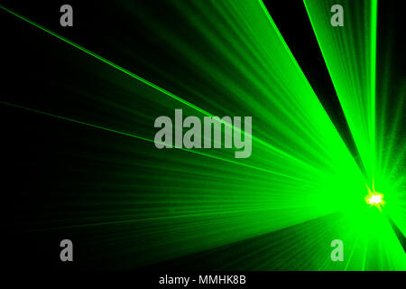 Lasershow in a club, disco with music, quite abstract, green laser Stock Photo