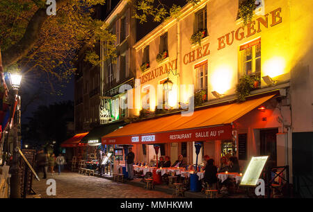 The French traditional cafe Chez Eugene at night, Paris, France. Stock Photo