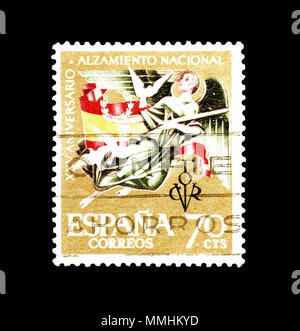 Cancelled postage stamp printed by Spain, that celebrates XXV Anniversary of National Uprising, circa 1962. Stock Photo