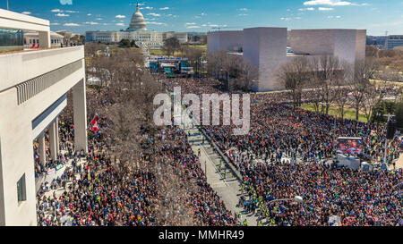 MARCH 24, 2018: Washington, D.C. Hundreds of thousands gather on Pennsylvania Avenue, NW in 'March for Our Lives' Rally and Protest, Washington D.C. which shows US Capitol Stock Photo