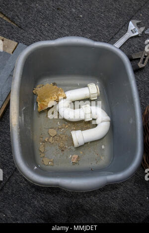 Drain 'U' bend trap in bowl Stock Photo