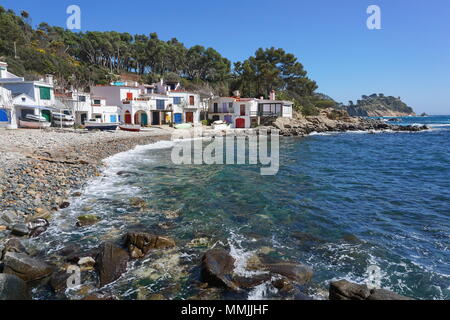 Spain old fishermen houses on the waterfront, Cala S'Alguer cove in Palamos, Mediterranean sea, Costa Brava, Catalonia, Baix Emporda Stock Photo