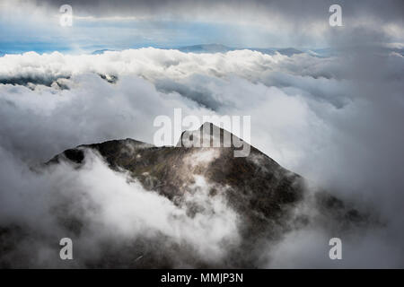 The Watkin trail on Mount Snowdon surrounded by cloud Stock Photo
