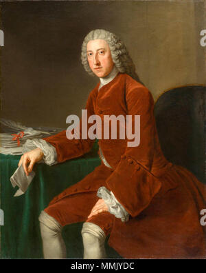 .  English: Portrait of the British statesman William Pitt, 1st Earl of Chatham (1708–1778), at three-quarter length, grey wig falling behind shoulders; rich brown velvet suit, white cravat, shirt and wrist ruffles; on the table an inkstand, pen and papers, a letter in his right hand; brown interior background; lit from left.  William Pitt, later First Earl of Chatham (1708–1778). circa 1754. Elderpitt Stock Photo