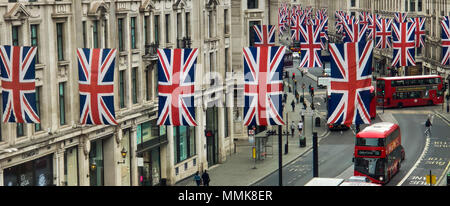 London. UK 12 May 2018 - Union flag hangs above LondonÕs Regent Street ahead of the Royal Wedding of Prince Harry and  Meghan Markle on May 19 at St George's Chapel in Windsor Castle. Credit Roamwithrakhee /Alamy Live News Stock Photo