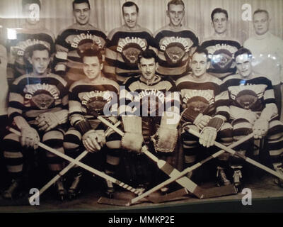 . English: A shot of the Brighton Tigers Ice Hockey Team taken in the late 1930's. Author unknown. Found hanging on the wall of The Basketmakers Arms pub in Brighton on 06/02/2015. Any more information is welcome.  . 6 February 2016, 19:02:47. Unknown author 98 Brighton Tigers Ice Hockey Team Stock Photo