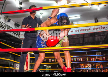 Chiang Mai, Thailand - July 25, 2011: Muay Thai Thai boxing match in the Thapae Boxing Stadium in town. Stock Photo