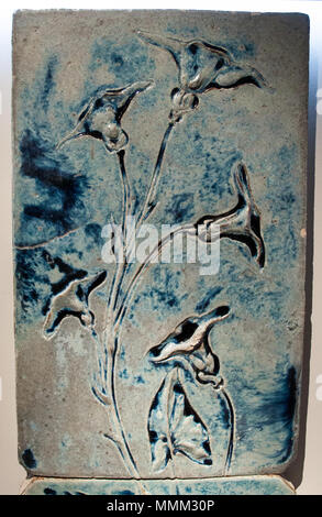 Blue-glazed revetment with stylized morning-glories. 1899. Bigot - Blue-glazed revetment Stock Photo