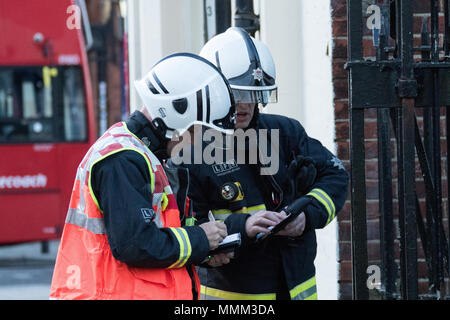 London Fire brigade attending a fire in East London. Stock Photo