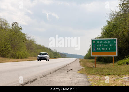 Sign on the Street and Landscape at Border to the Guantanamo province, Cuba Stock Photo