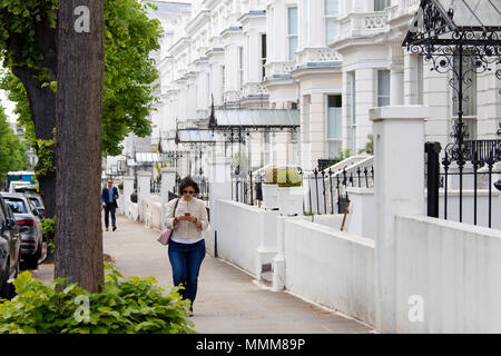 LONDON, UK - MAY 10th, 2018:  Holland Park Street has some of the most expensive houses in London. The street is popular with celebrities, embassies a Stock Photo