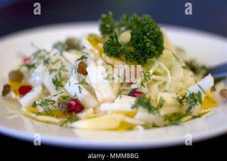 Mixed vegetables on  a plate against dark background Stock Photo
