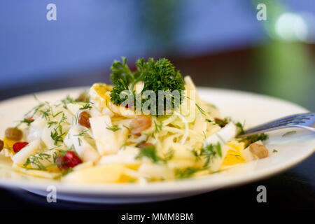 Mixed vegetables on  a plate against dark background Stock Photo