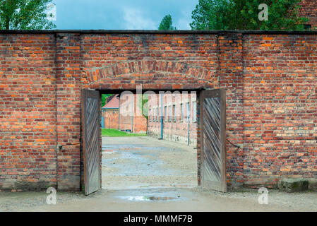 Auschwitz, Poland - August 12, 2017: gate to the Auschwitz concentration camp, brick walls Stock Photo