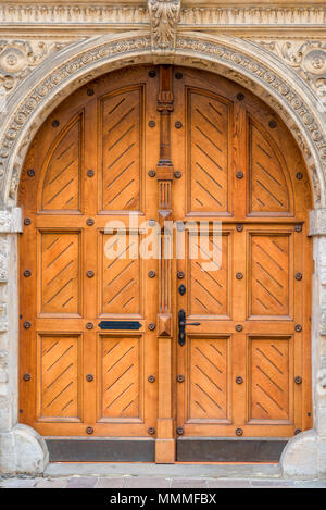 closeup of a beautiful wooden door in the building Stock Photo