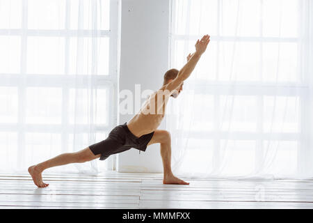 Man practicing advanced yoga. A series of yoga poses. lifestyle concept  Stock Photo - Alamy