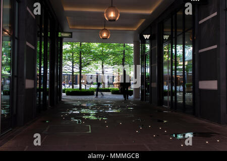 People walk through Denman Place towards Ham Yard Hotel in Soho, London Stock Photo