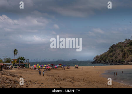 Beach Scene on Taboga Island with the skyline of Panama City in the background Stock Photo