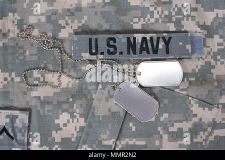 us navy camouflaged uniform with blank dog tags Stock Photo