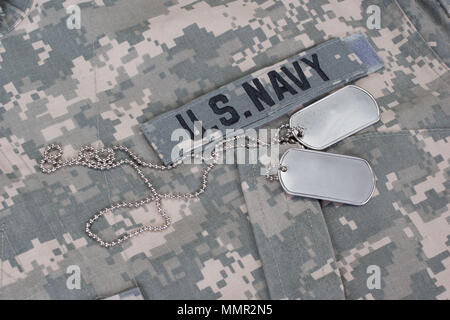 us navy camouflaged uniform with blank dog tags Stock Photo