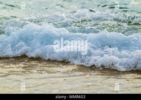 Wave of the sea on the sand beach Stock Photo