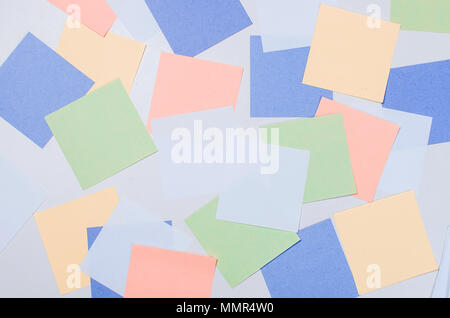 lot of various colored note papers on white background Stock Photo