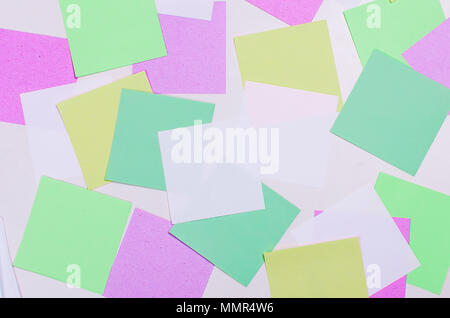 lot of various colored note papers on white background Stock Photo