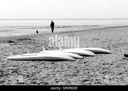 windsurf tables on the sand in a mediterranean beach Stock Photo