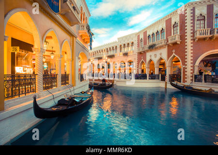 LAS VEGAS, NEVADA - MAY 18, 2017: Inside view of Grand Canal at the Venetian Hotel Casino Resort in beautiful Las Vegas with people and gondola in vie