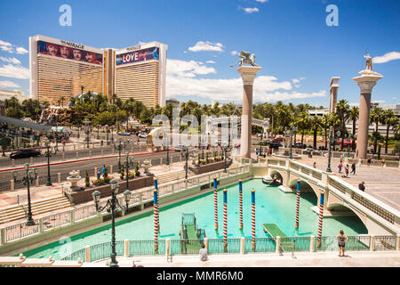 LAS VEGAS, NEVADA - MAY 18, 2017: View of The Venetian and Mirage Hotel Resort and Casino along the Vegas Strip on a sunny day.