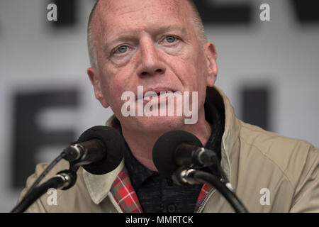 London, UK. 12th May, 2018. Matt Wrack, General Secretary of the Fire Brigades Union(FBU), speaks to a crowd of  thousands of trade unionists during a TUC rally in Hyde Park. Credit: Guy Corbishley/Alamy Live News Stock Photo