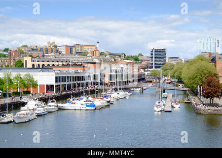 Bristol, UK. 13th May 2018. People enjoy the sun on Bristol Harbourside. Food stalls are busy with a cosmopolitan range to be enjoyed outside. Market stalls provide books and  cake ©Mr Standfast/Alamy Live News Bordeux quay Stock Photo