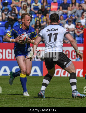 13th May 2018 , Halliwell Jones Stadium , Warrington, England; Ladbrokes Challenge Cup rugby, Toronto Wolfpack v Warrington Wolves; Kevin Brown of Warrington Wolves looks for a way past Andrew Dixon of Toronto Wolfpack Credit: News Images /Alamy Live News Stock Photo