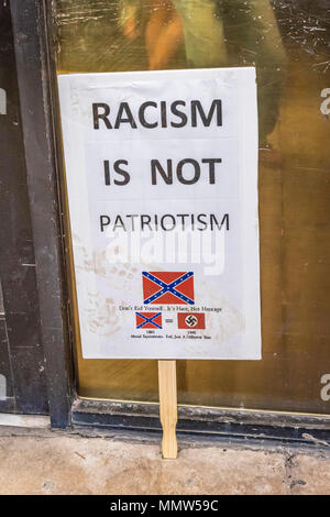 AUGUST 22, 2017, PHOENIX, AZ   RACISM IS NOT PATRIOTISM PROTEST SIGN at Phoenix Convention Center, Trump Rally, 2020 President Donald J. Trump Stock Photo