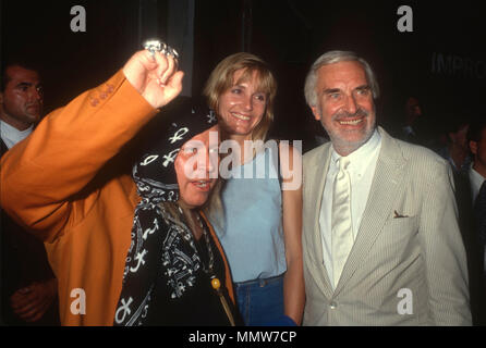 WEST HOLLYWOOD, CA - JULY 13: (L-R) Comedian Sam Kinison, Gretchen Becker and actor Martin Landau attend Milton Berle's 82nd birthday party at The Improv on July 13, 1990 in West Hollywood, California. Photo by Barry King/Alamy Stock Photo Stock Photo