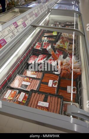 Inside Aldi supermarket with aisles and fridges Stock Photo