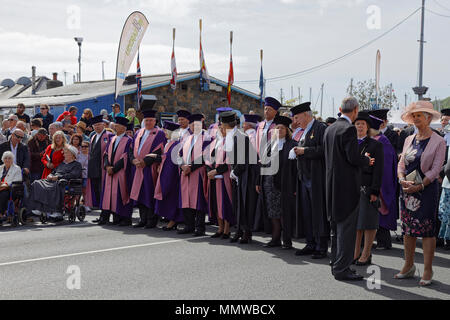 Guernsey's Jurats in purple robes wait to begin their procession during Guernseys 73rd Liberation Day Celebrations. Stock Photo