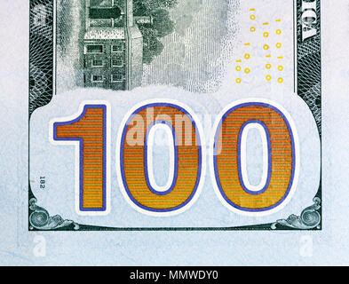 Number 100. Hundred dollars bill fragment closw-up, new edition. Stock Photo