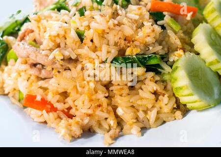 Thai food style , fried rice with pork on white background.Closed up Stock Photo