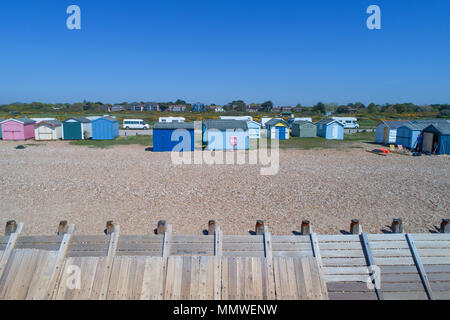 aerial views along the coast of hayling island and the beach huts in hampshire by drone Stock Photo