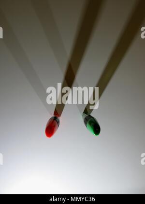 Highlighters casting shadows on white background. Stock Photo