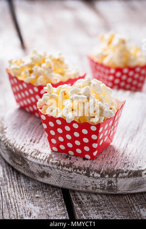 Popcorn in red polka dot pack  Stock Photo