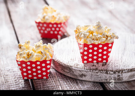 Popcorn in red polka dot pack  Stock Photo
