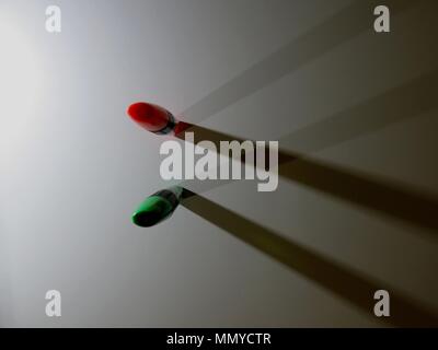 Highlighters casting shadows on white background. Stock Photo