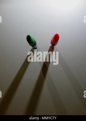 Highlighters casting shadows on white background. Stock Photo