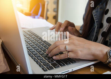 Woman office worker typing on the keyboard Stock Photo