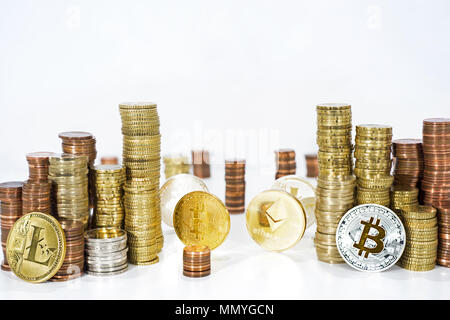 Abstract photo of cryptocyrrency. Some big crypto currency coins with euro coins. Isolated on white background. Stock Photo